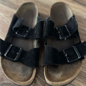 Extremely well loved Birkenstocks.
